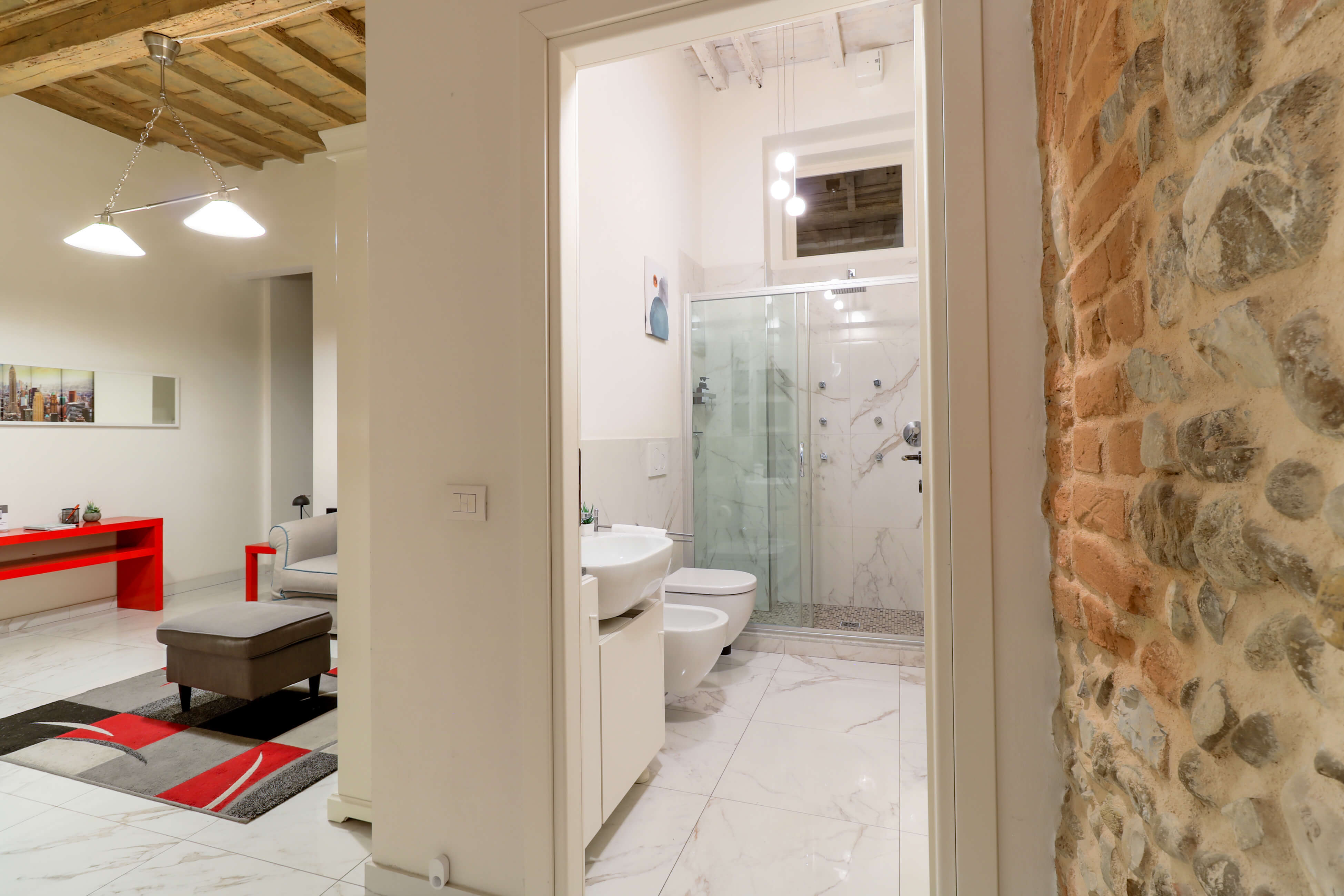 Bathroom w shower + view of the entrance